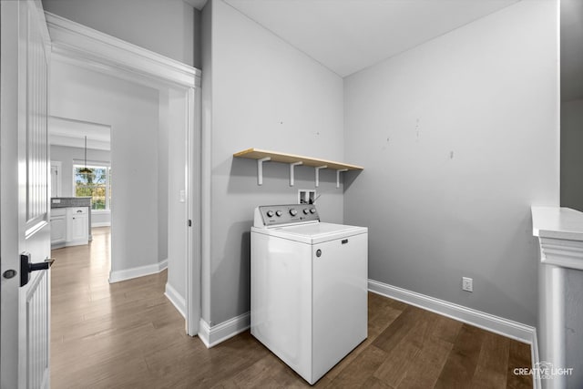 washroom featuring washer / clothes dryer and dark hardwood / wood-style floors