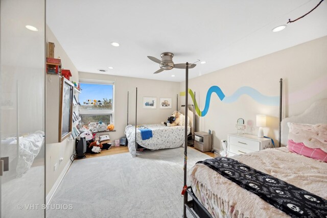 bedroom featuring hardwood / wood-style flooring and ceiling fan