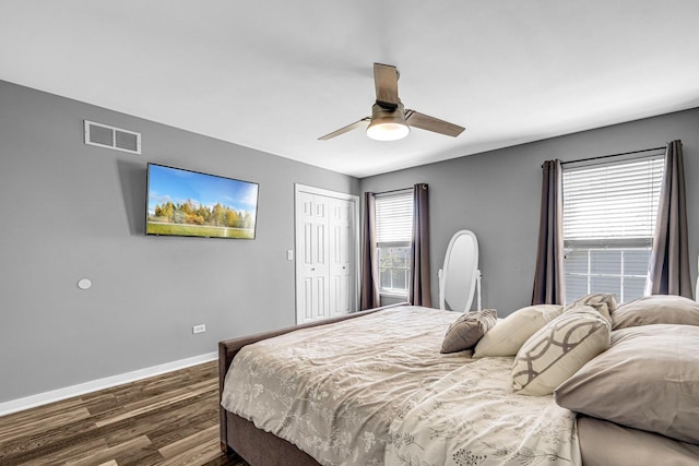 4661 W Tulip Ave, Monee, IL 60449 - bedroom with baseboards, dark wood-type flooring, a closet, and a ceiling fan