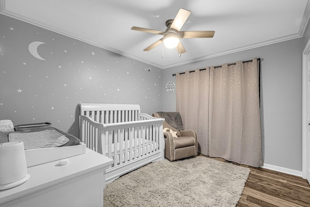 4661 W Tulip Ave, Monee, IL 60449 - bedroom with crown molding, wood finished floors, a crib, and ceiling fan