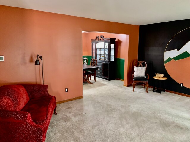 living area featuring carpet flooring