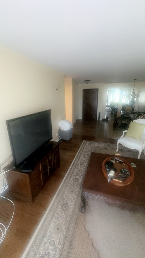 living room with hardwood / wood-style flooring