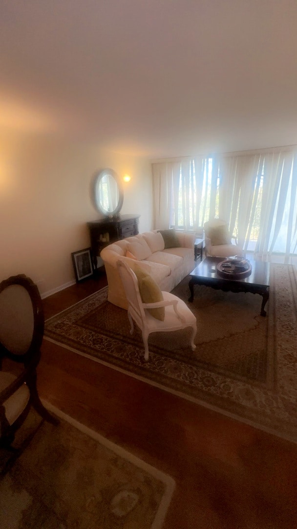 living area featuring hardwood / wood-style flooring