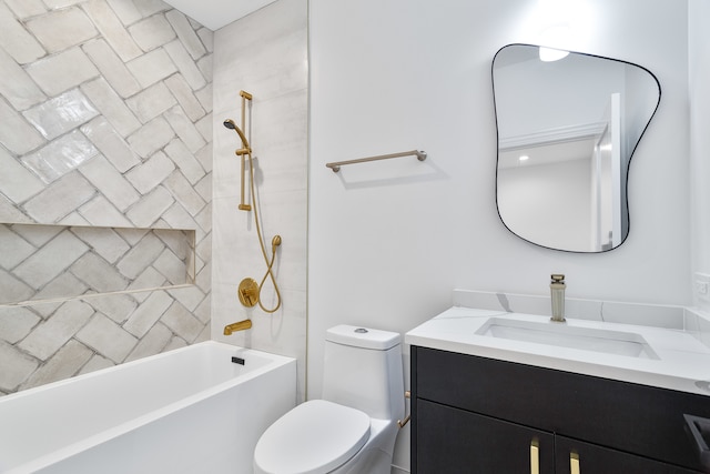 full bathroom featuring vanity, toilet, and tiled shower / bath