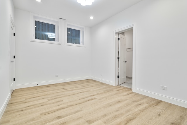 empty room featuring light hardwood / wood-style floors