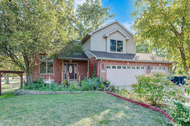 view of front of home with a garage and a front yard