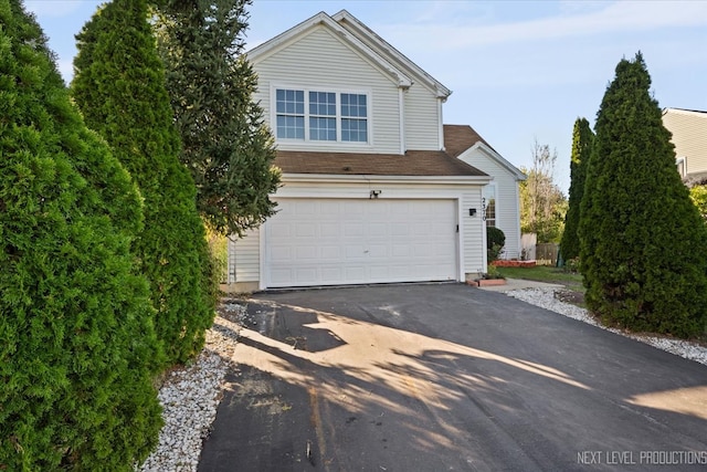 front of property featuring a garage