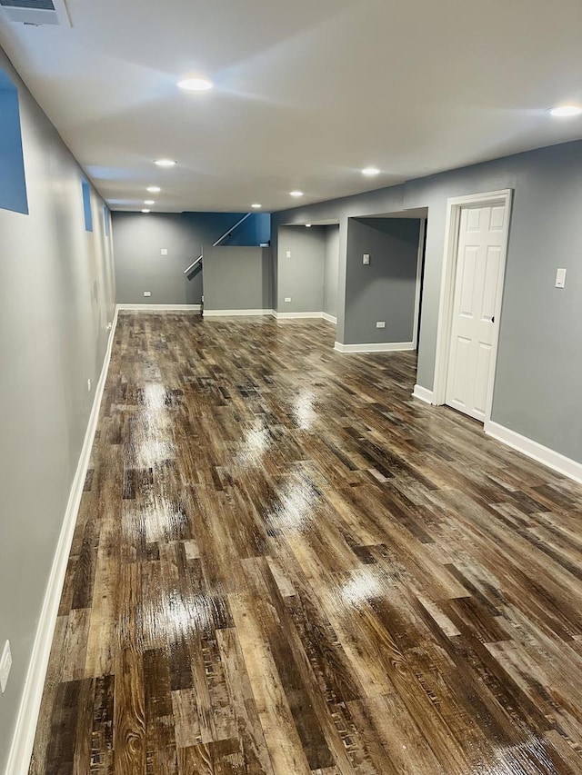 basement featuring dark wood-type flooring