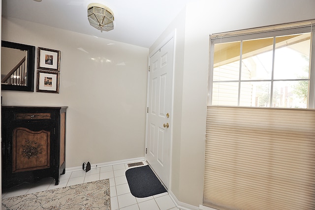 interior space with light tile patterned flooring