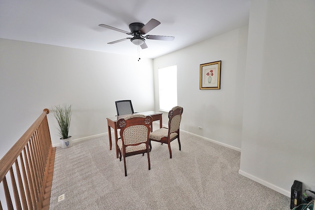 office area with light colored carpet and ceiling fan