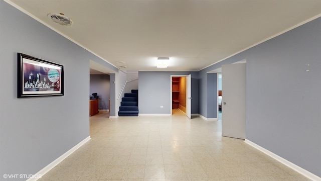 interior space featuring crown molding