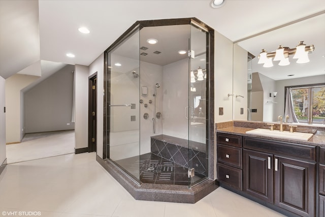 bathroom featuring vanity, tile patterned floors, and an enclosed shower