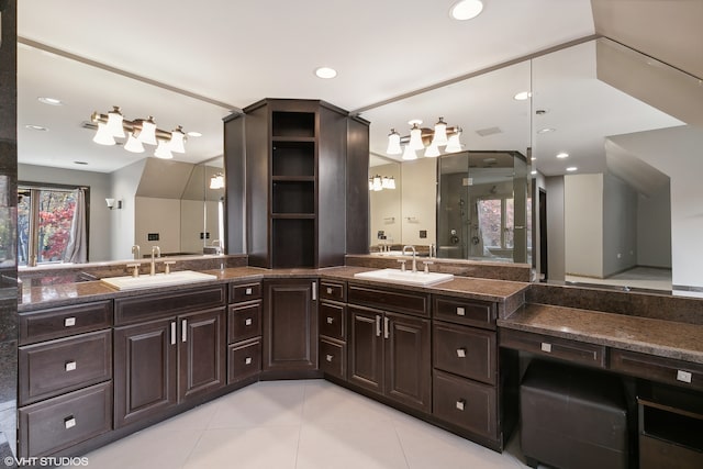 bathroom featuring vanity and walk in shower