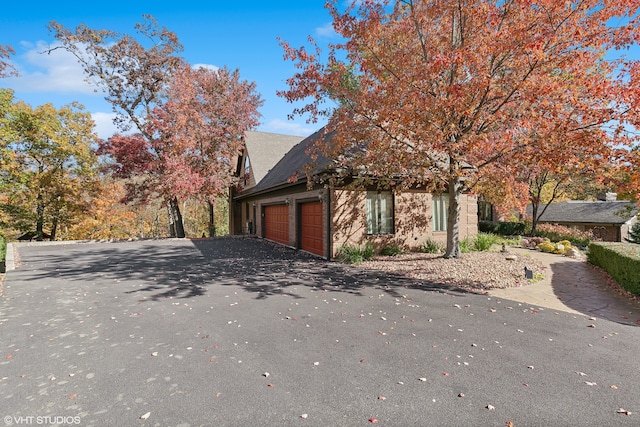 view of home's exterior with a garage