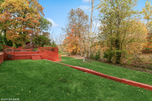 view of yard with a deck