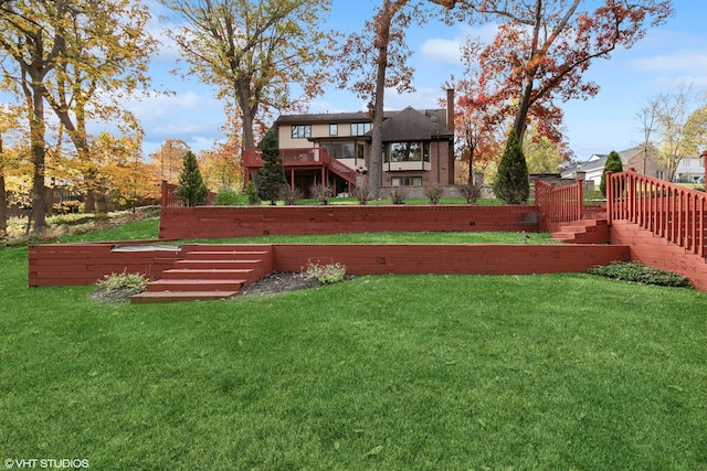 view of yard with a wooden deck