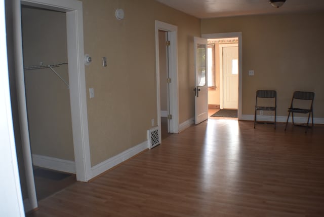 empty room featuring hardwood / wood-style flooring