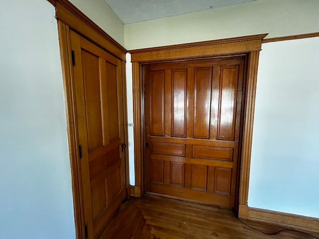 hall with dark hardwood / wood-style flooring