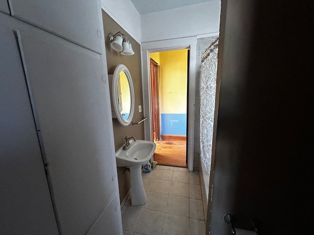 bathroom featuring tile patterned flooring