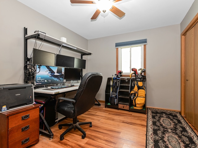 office space featuring light hardwood / wood-style floors and ceiling fan