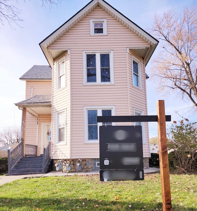 exterior space featuring a front lawn