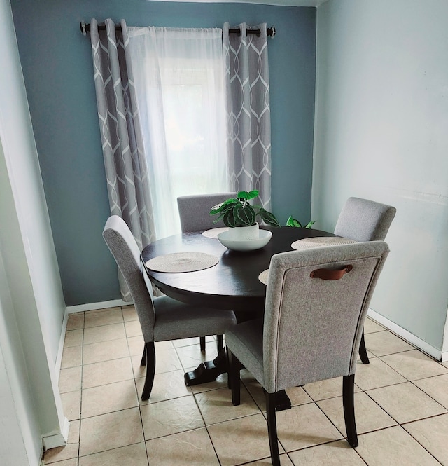 view of tiled dining space