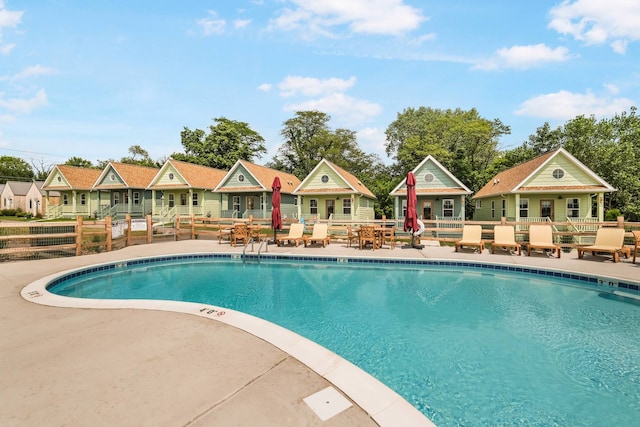 view of swimming pool featuring a patio area