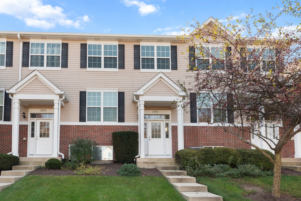 view of property with a front yard