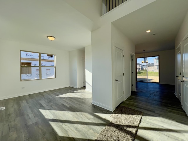 interior space with hardwood / wood-style flooring