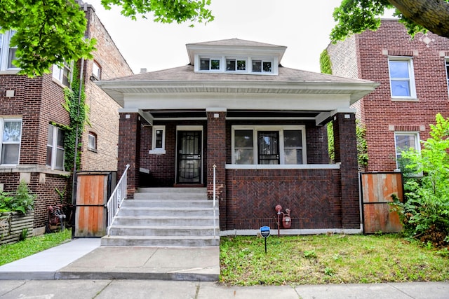 bungalow-style house featuring a porch