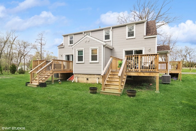 back of house featuring a yard, a wooden deck, and cooling unit