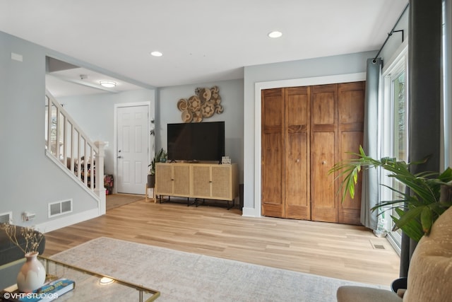 living room with light wood-type flooring