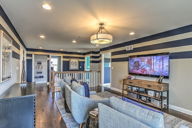 home theater featuring dark hardwood / wood-style flooring