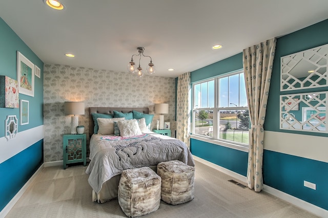 bedroom with light colored carpet