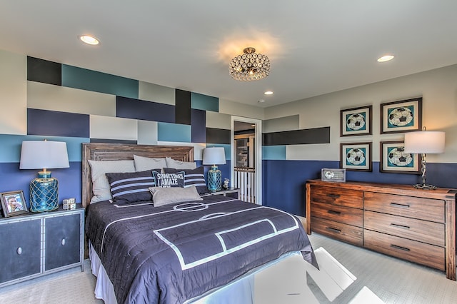 bedroom with light colored carpet