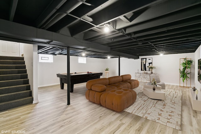 basement featuring light hardwood / wood-style floors