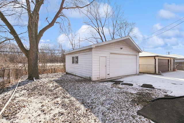 view of snow covered garage