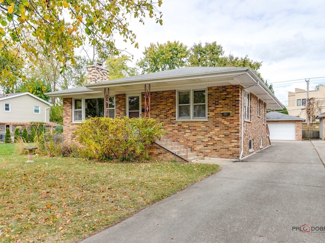 ranch-style home with a garage and a front yard