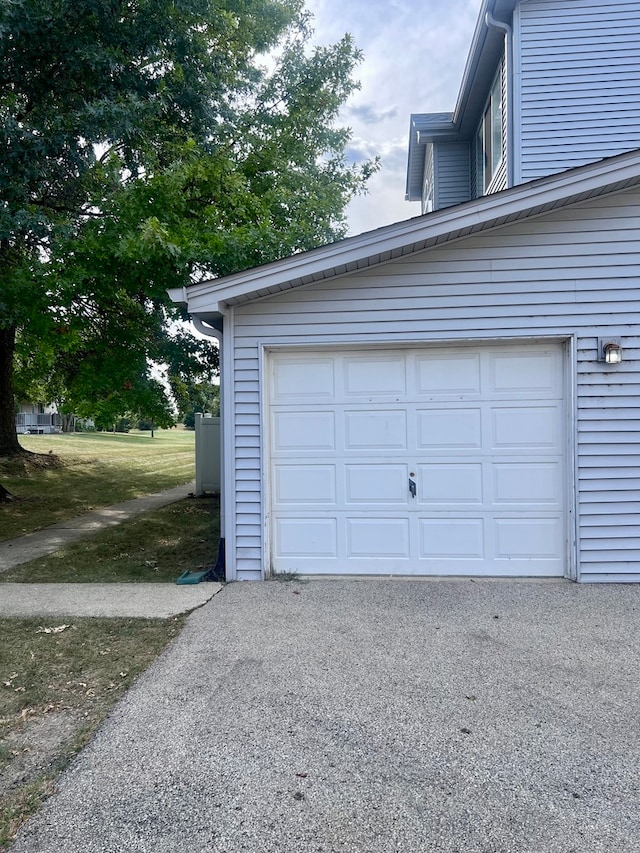 garage featuring wooden walls