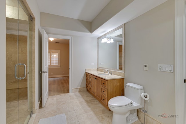 bathroom with vanity, tile patterned flooring, an enclosed shower, a chandelier, and toilet