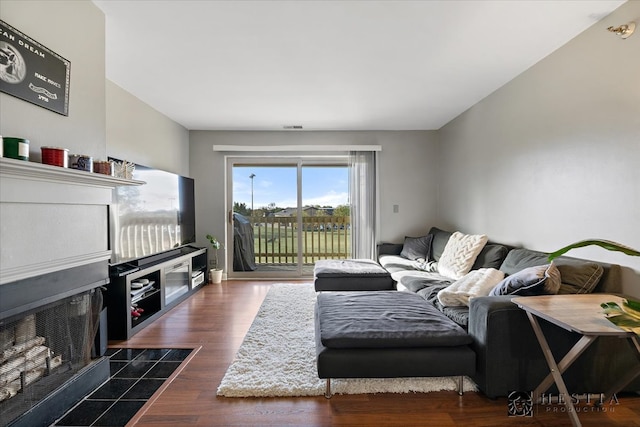 living room featuring dark hardwood / wood-style floors