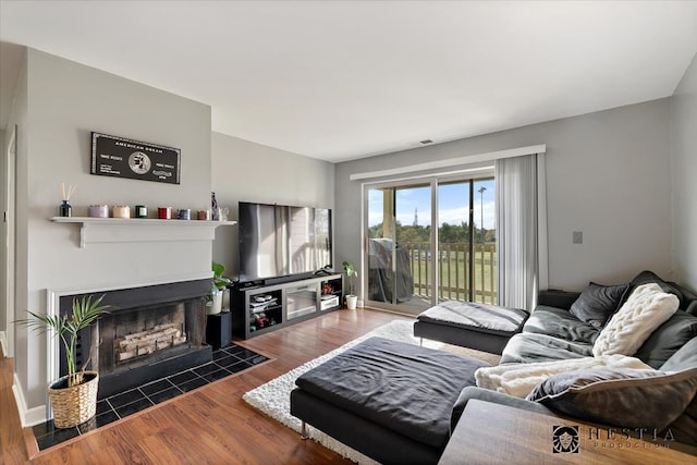 living room with dark hardwood / wood-style floors