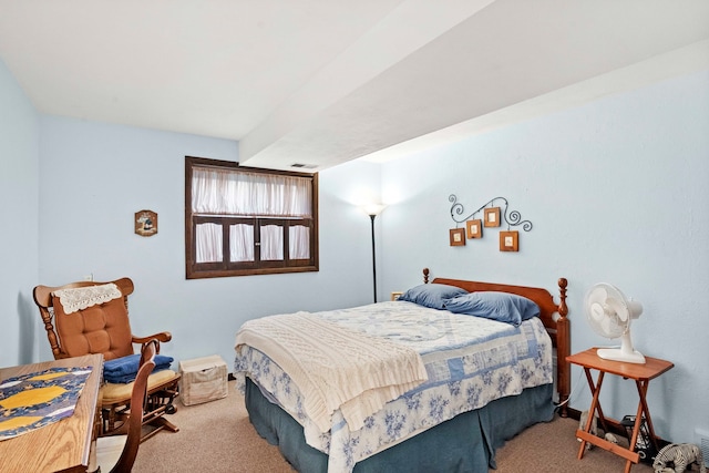 bedroom featuring light colored carpet