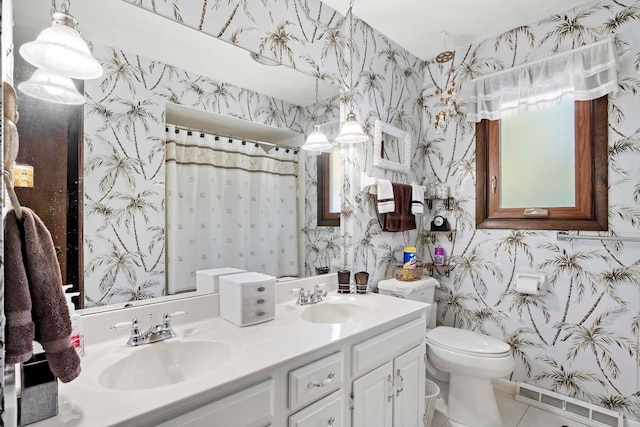 bathroom with vanity, toilet, a shower with curtain, and tile patterned flooring