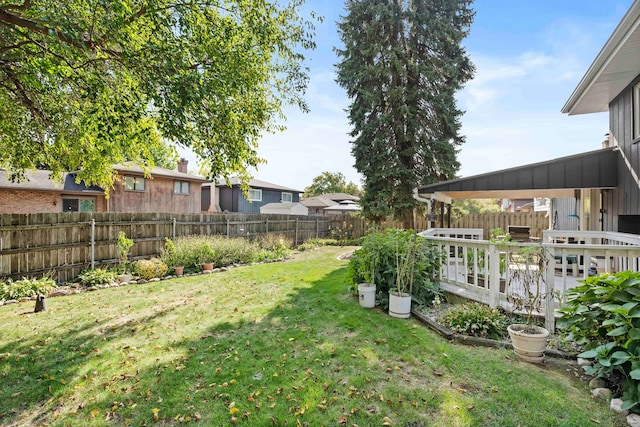 view of yard with a deck