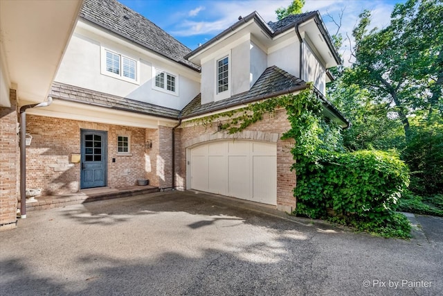 view of front of property with a garage