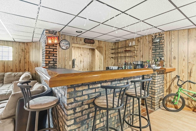 1632 Stanton Ave, Whiting, IN 46394 - bar featuring a dry bar, wood finished floors, wooden walls, and a drop ceiling