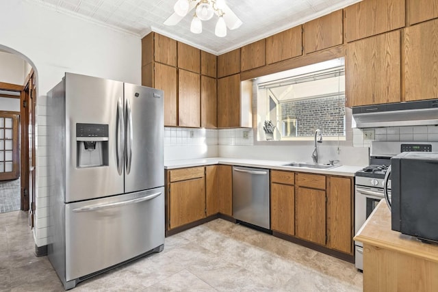 1632 Stanton Ave, Whiting, IN 46394 - kitchen featuring a sink, appliances with stainless steel finishes, light countertops, under cabinet range hood, and a ceiling fan