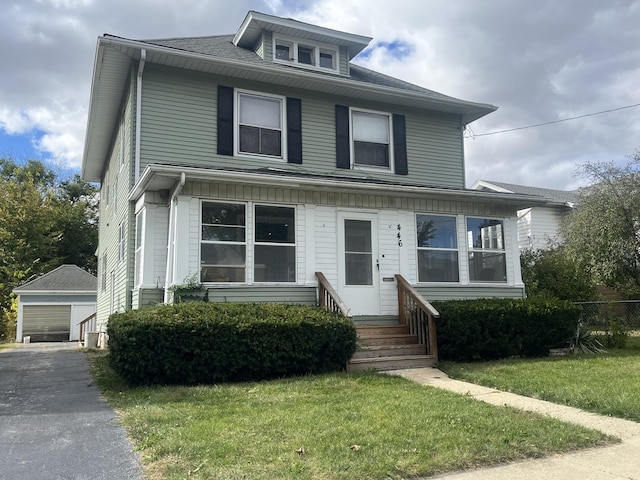 444-446 N View St, Aurora, IL 60506 - traditional style home featuring an outbuilding, a garage, and a front yard