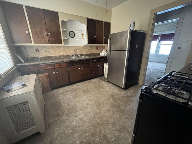 444-446 N View St, Aurora, IL 60506 - kitchen featuring freestanding refrigerator, black range with gas cooktop, dark brown cabinetry, and open shelves